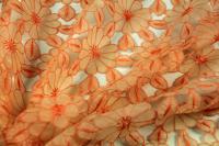 ткань Оранжевая органза с фактурными цветами (нашитыми цветами)