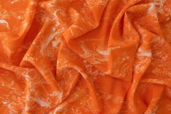 ткань оранжевый крепдешин с белым рисунком Италия