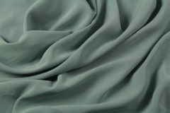 ткань бледно-бирюзовая купро костюмно-плательная купра однотонная зеленая Италия