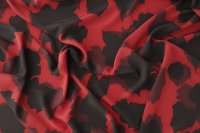 ткань красный крепдешин с черными абстрактными листьями
