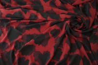 ткань красный крепдешин с черными абстрактными листьями