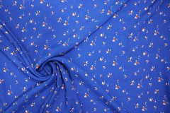 ткань креповая вискоза василькового цвета с мелкими цветочками креп вискоза цветы голубая Италия