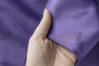 ткань подклад из вискозы фиолетового цвета с надписями