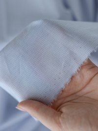 ткань хлопок белого цвета в голубую мелкую клеточку