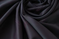 ткань подклад черного цвета с вишневым подтоном и надписями