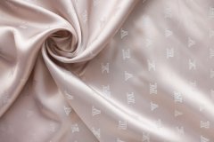 ткань подклад пыльно-розовый с логотипами подклад вискоза иные розовая Италия