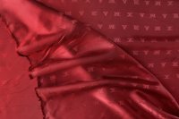 ткань подклад из вискозы красного цвета с логотипами