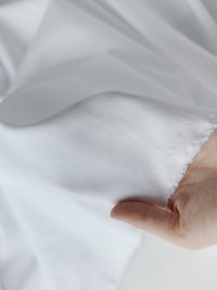 ткань костюмно-плательный полиэстер белого цвета